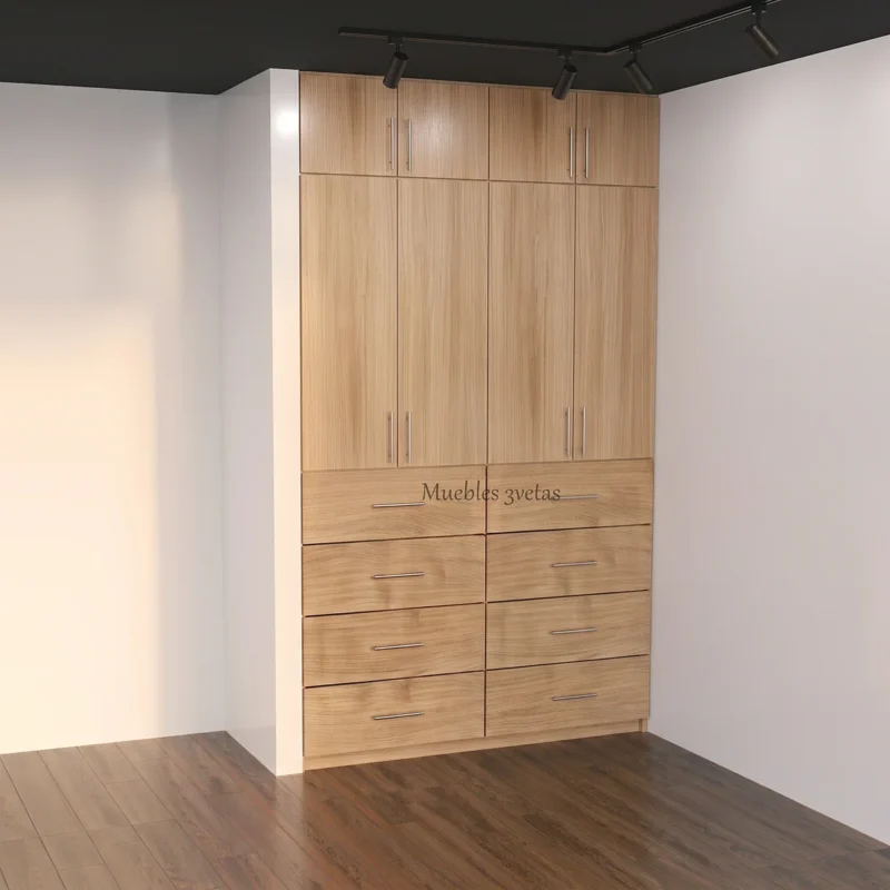 Un moderno sistema de armario empotrado de madera clara con ocho cajones y tres grandes armarios superiores de puertas dobles, de Muebles 3vetas.